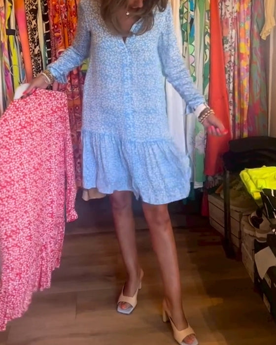 V-ringad klänning med blommönster