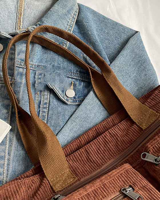 Enfärgad manchesterväska