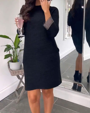 Elegant klänning i rund hals