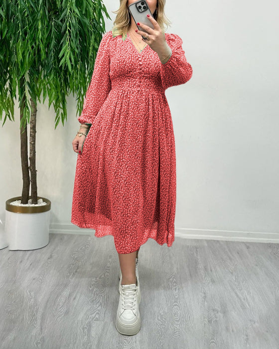 Elegant klänning med tryck