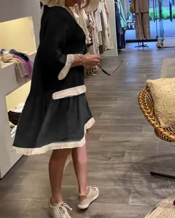 V-ringad frans i spets avslappnad klänning