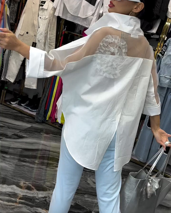 Lapelblom i spets med lapptäcke