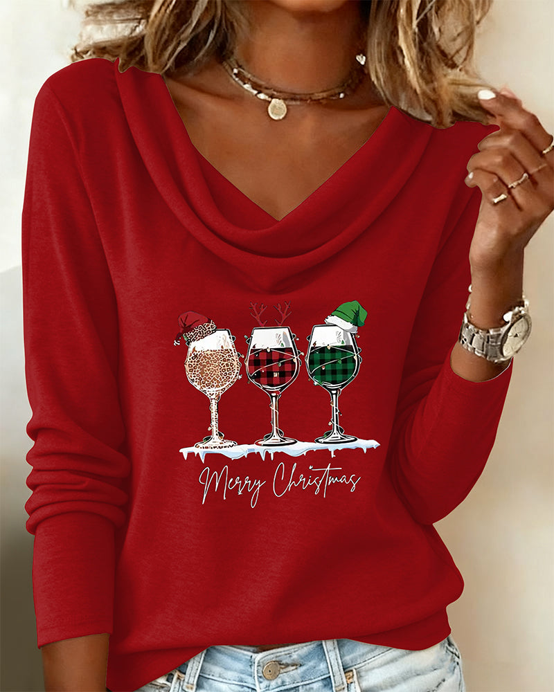 Topp med staplad krage och vinglastryck