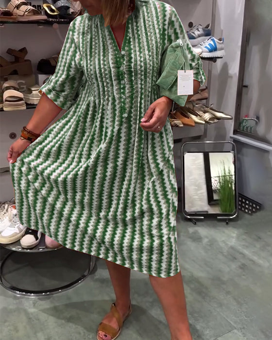 Klänning med vågmönster