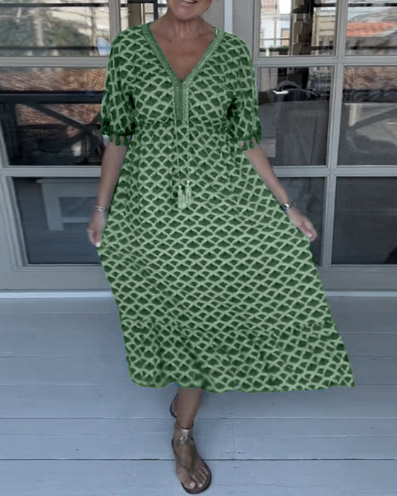 V-ringad ledig klänning med tryck