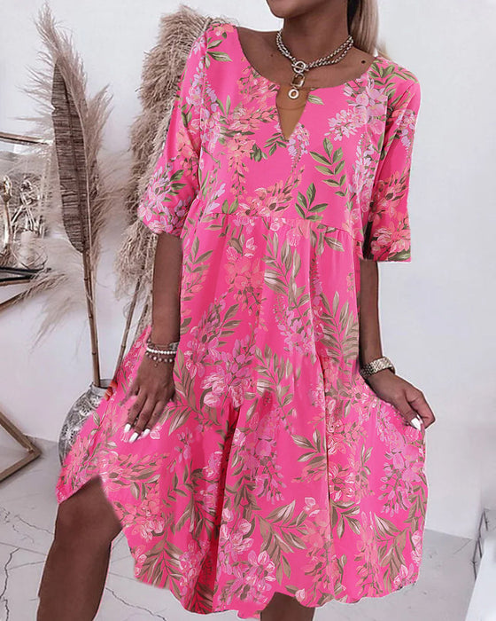 Skiftklänning med blommönster