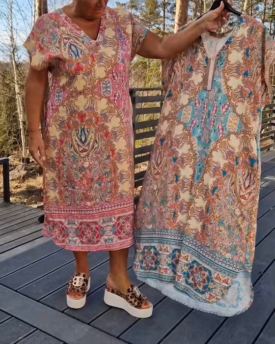 Klänning V-Ringad Kortärmad Mönstrad Rak