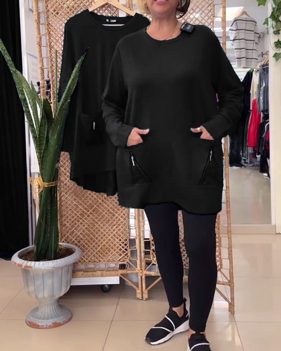 Enfärgad dragkedja i enfärgad tröja med rund hals