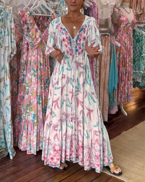 V-ringad maxiklänning med bladtryck för kvinnor