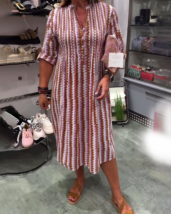 Klänning med vågmönster