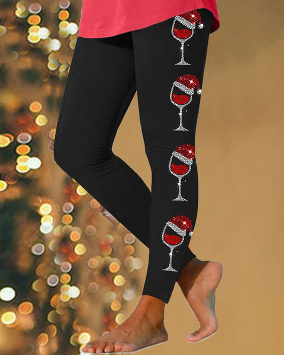 Kvinnors leggings med glänsande vinglastryck för god jul