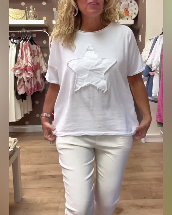 T-shirt med avslappnad lös halsringning