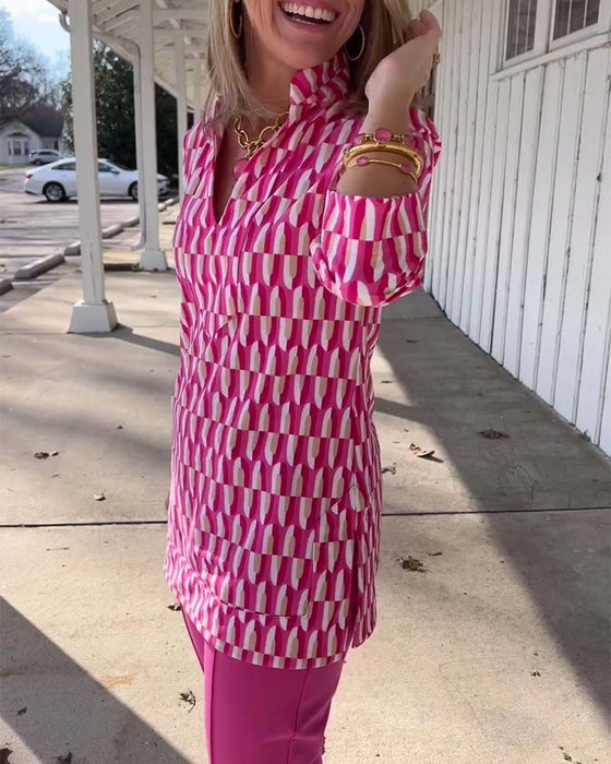 Tryckt topp med stativkrage och nio fjärdedels ärm