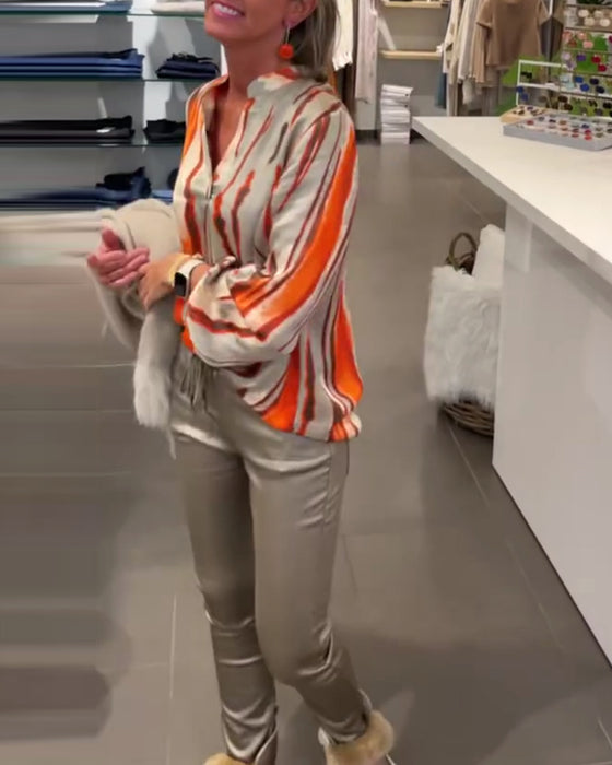 Långärmad blus med randigt tryck