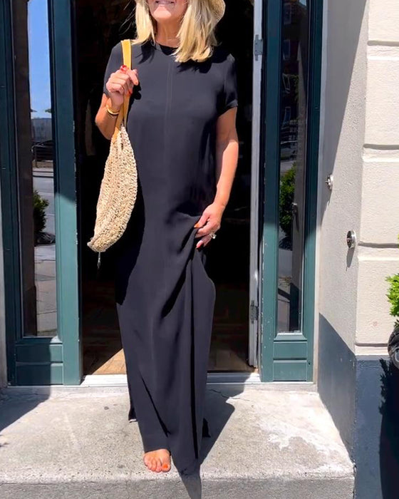 Elegant klänning med korta ärmar i enfärgad