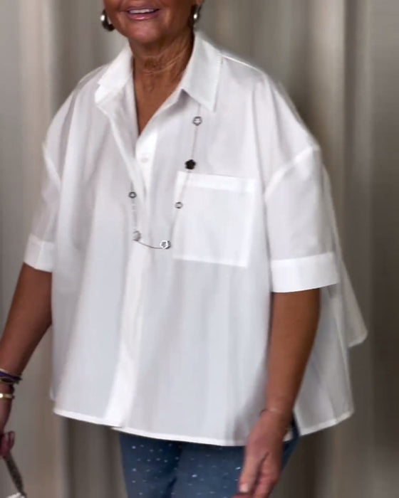 Rynkad blus med kort ärm