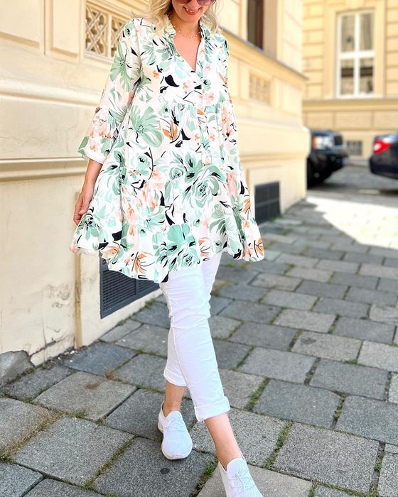 V-ringad blommig elegant blus