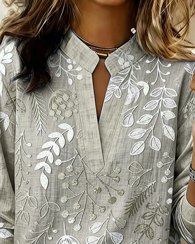 Blus Med Blommigt Mönster Och Ståkrage