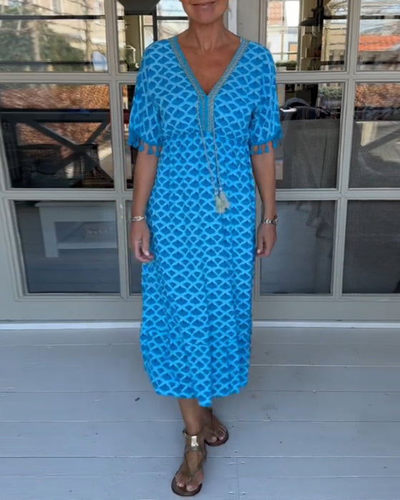 V-ringad ledig klänning med tryck