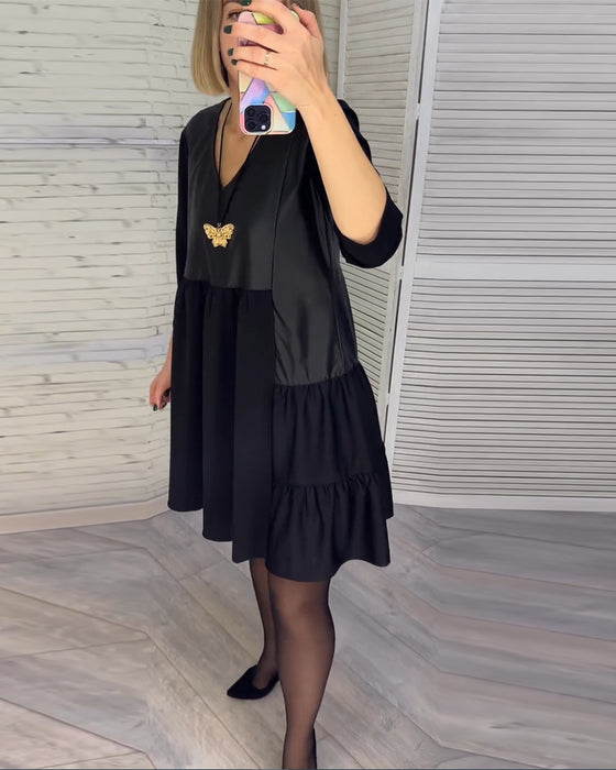 Patchwork klänning med V-ringning