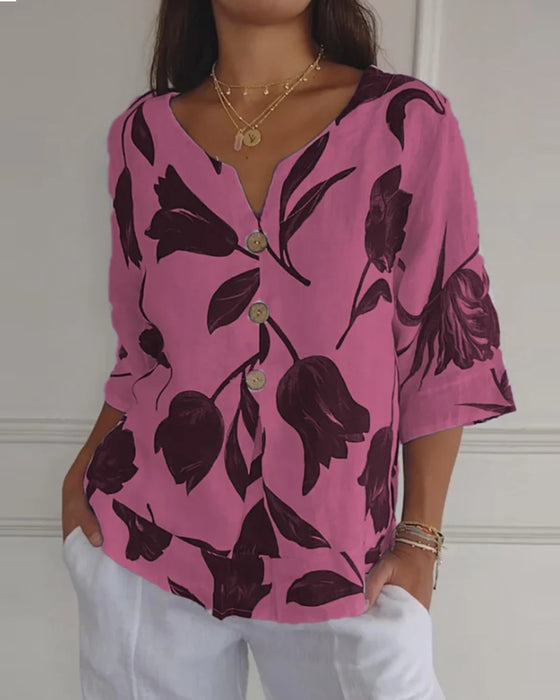 Blommig topp i bomull och linne med knappar