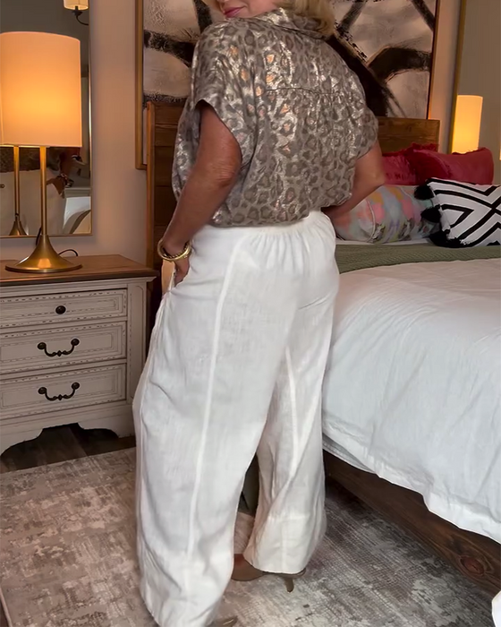 Blus avslappnad leopardmönstrad