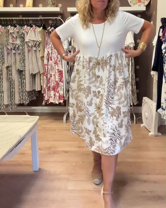 Klänning avslappnad temperament med tryck och rund hals