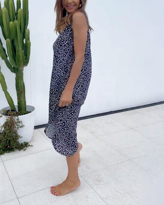 Ärmlös klänning med v-ringad tryck