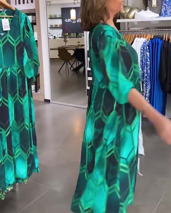 Trekvartsärm med V-ringad klänning