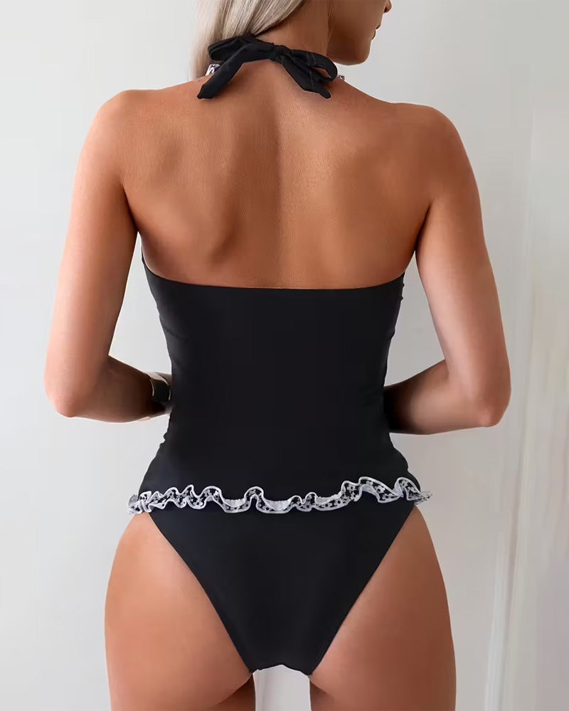 Tvådelad baddräkt med avslappnad volang och v-ringning