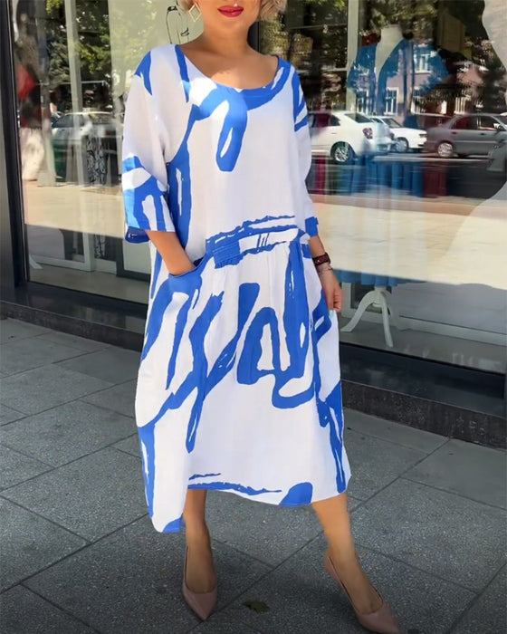 Modetryck fickklänning