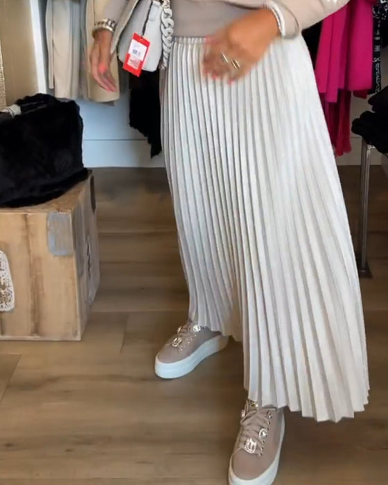 Plisserad enfärgad klänning