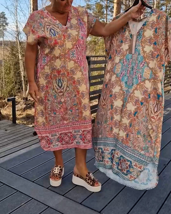 Klänning V-Ringad Kortärmad Mönstrad Rak