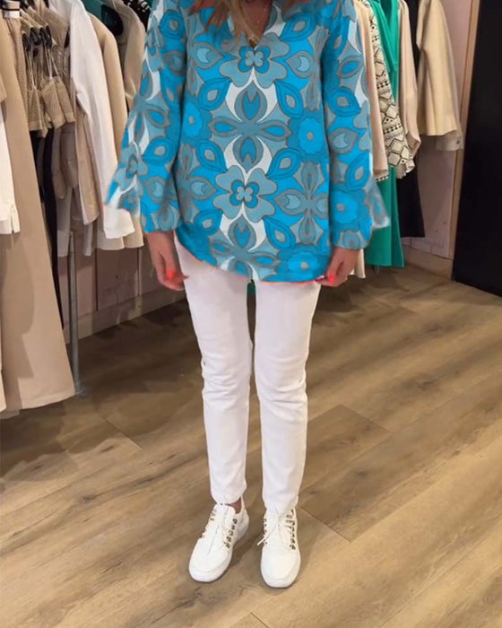 Blus med lösa, mångsidiga stilar och tryck