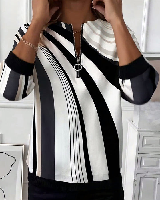 T-shirt med geometriskt tryck och dragkedja