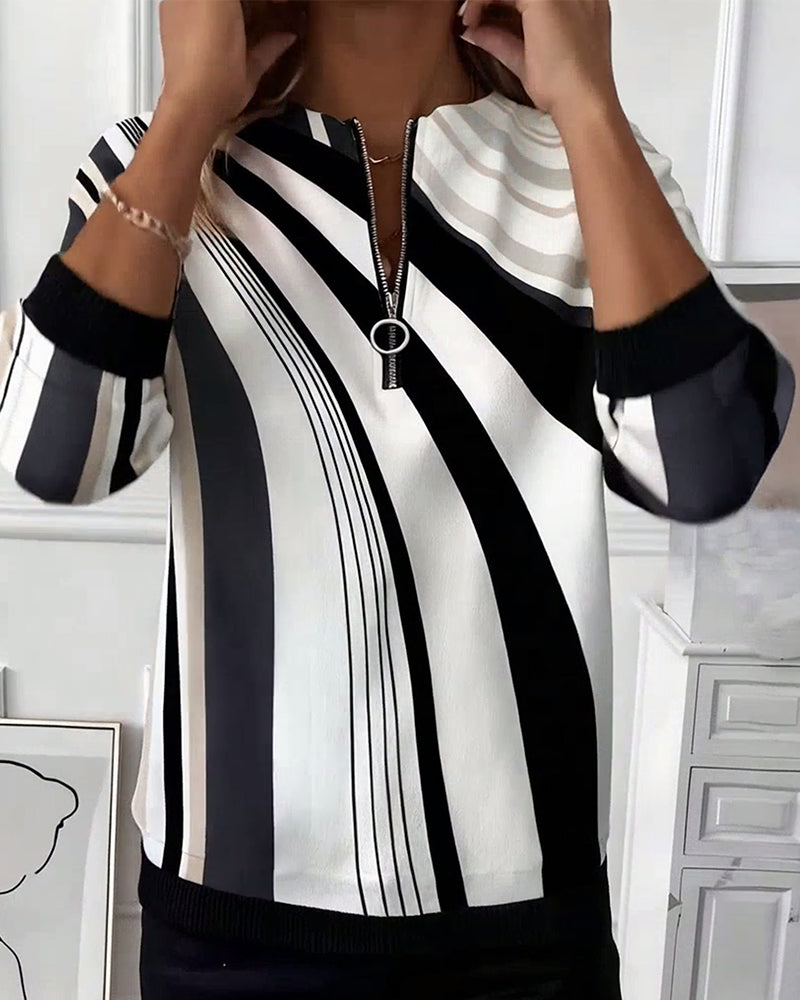 T-shirt med geometriskt tryck och dragkedja