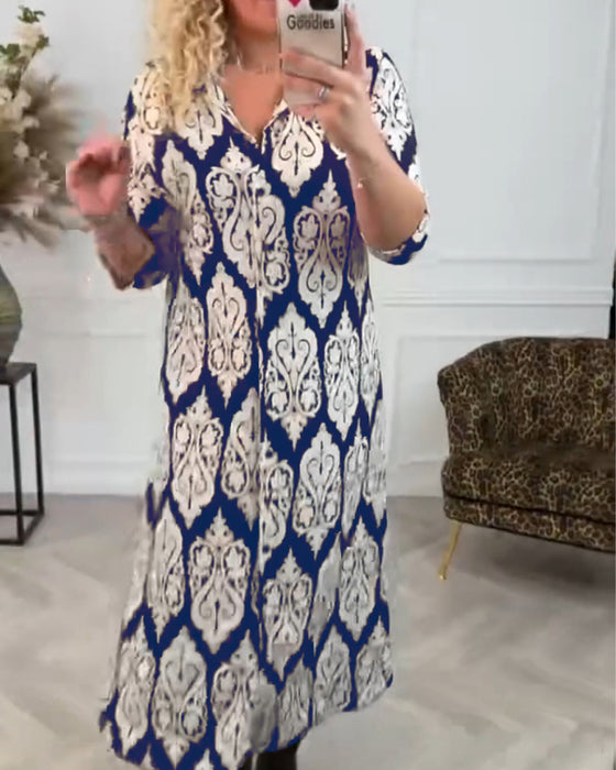 Lapelklänning med tryck i sidled