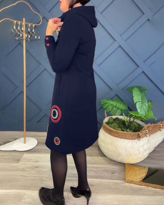 Avslappnad klänning med luva i cirkeltryck med dragkedja