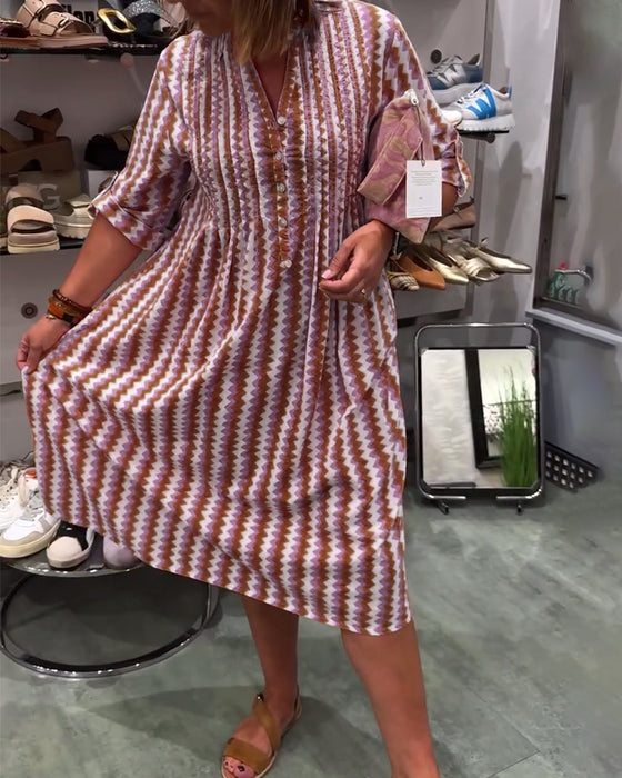 Klänning med vågmönster