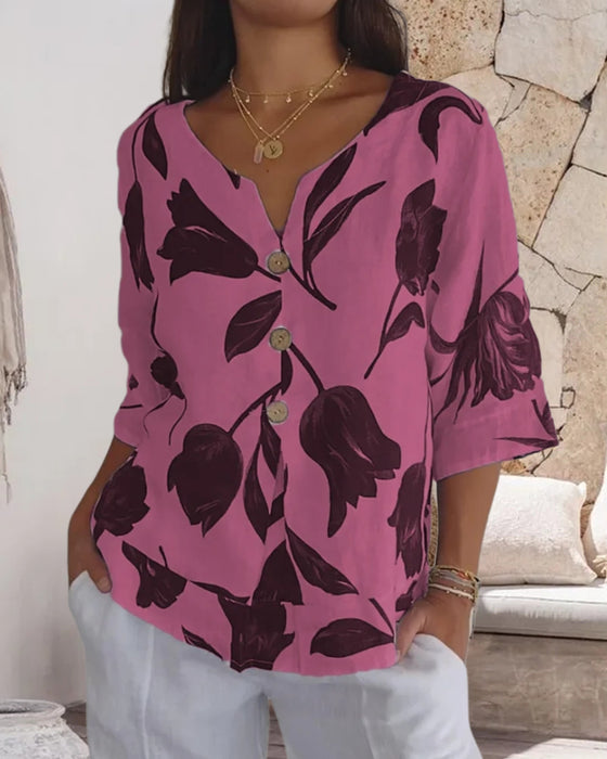 Blommig topp i bomull och linne med knappar