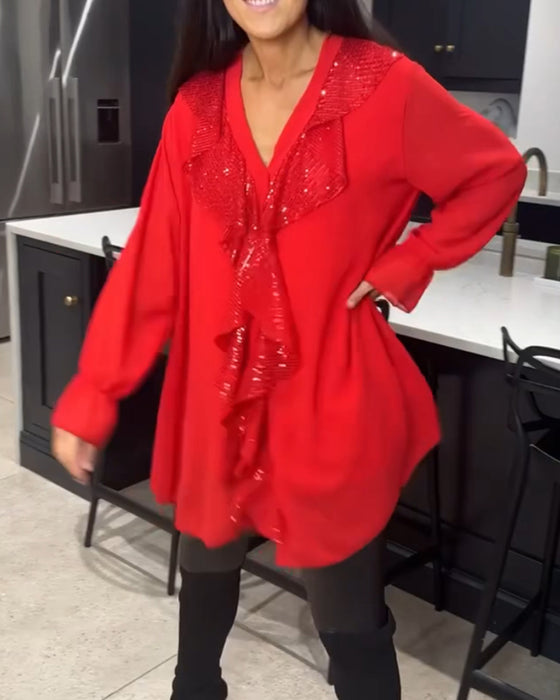 Blus med volanger och elegant stil