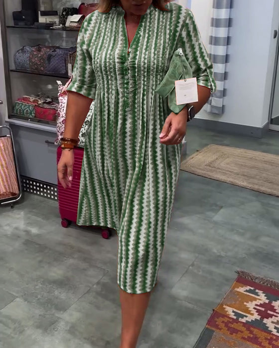 Klänning med vågmönster