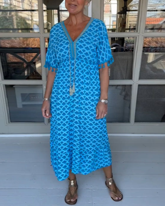 V-ringad ledig klänning med tryck