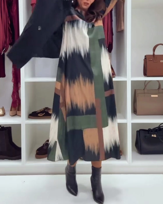 Modig Tryckt Klänning Med Runt Halsutsnitt Och Långa Ärmar