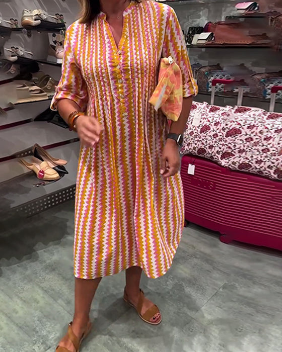 Klänning med vågmönster