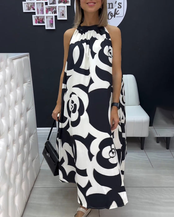 Ärmlös elegant tryckt klänning