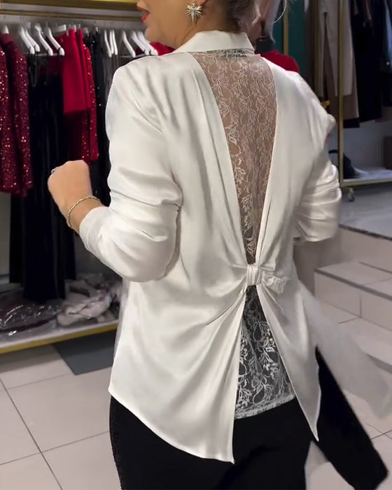 Stilren Blus med Spets och Rosettknut