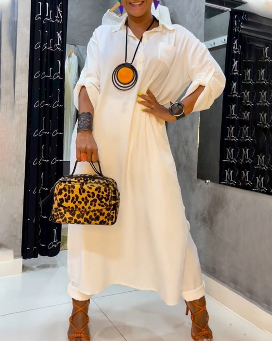 Enfärgad klänning med lapelficka