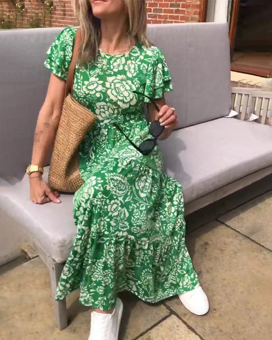 Kortärmad långklänning med blommönster