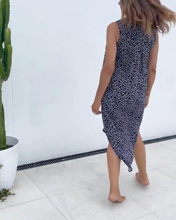 Ärmlös klänning med v-ringad tryck